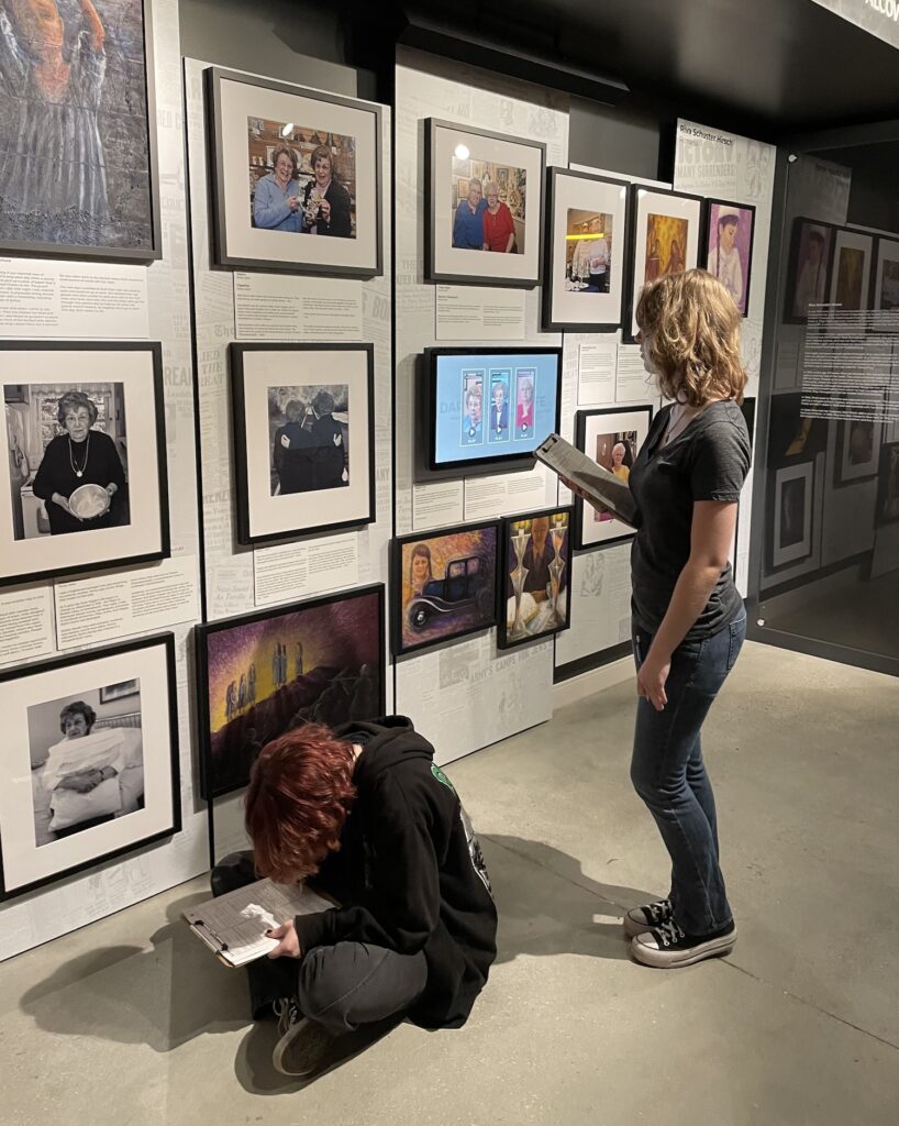 Students looking at exhibits